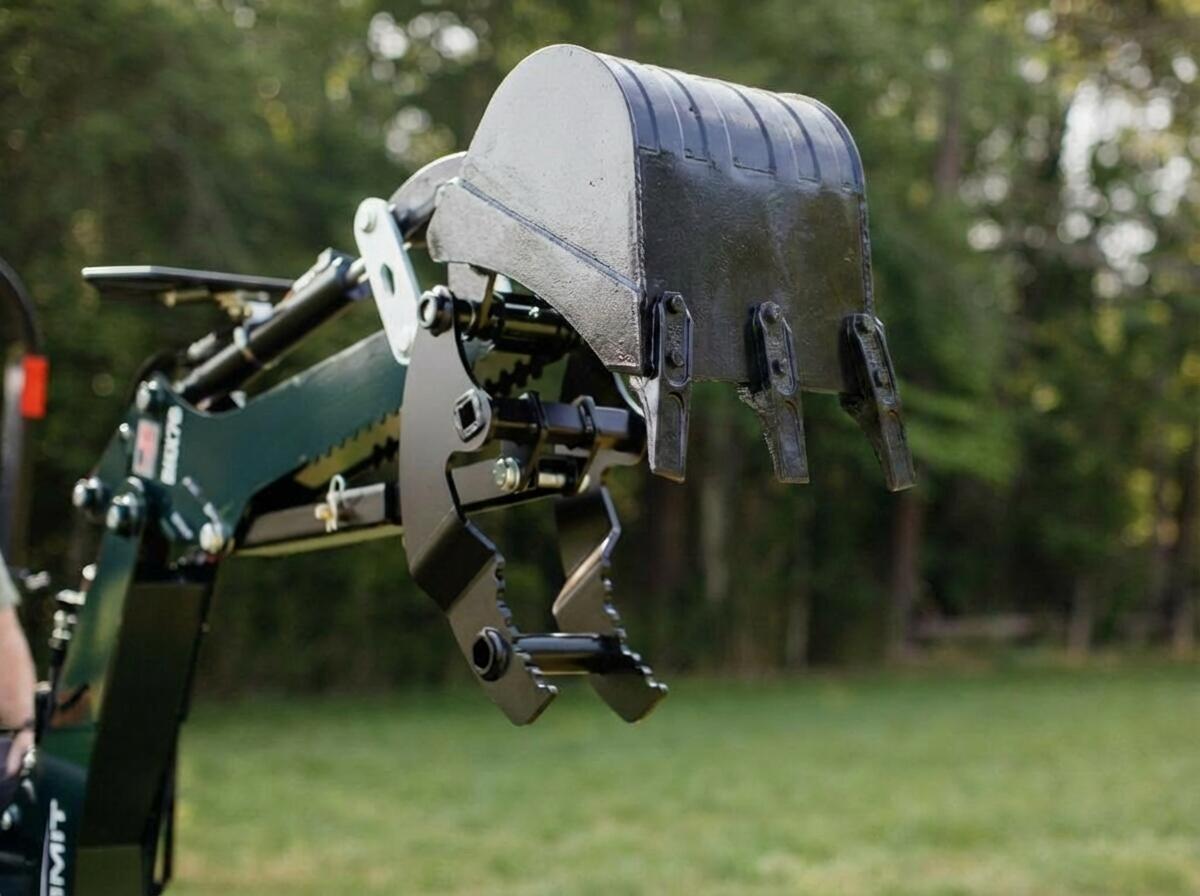 Summit BHBX16 optional 16 inch backhoe bucket mounted on backhoe