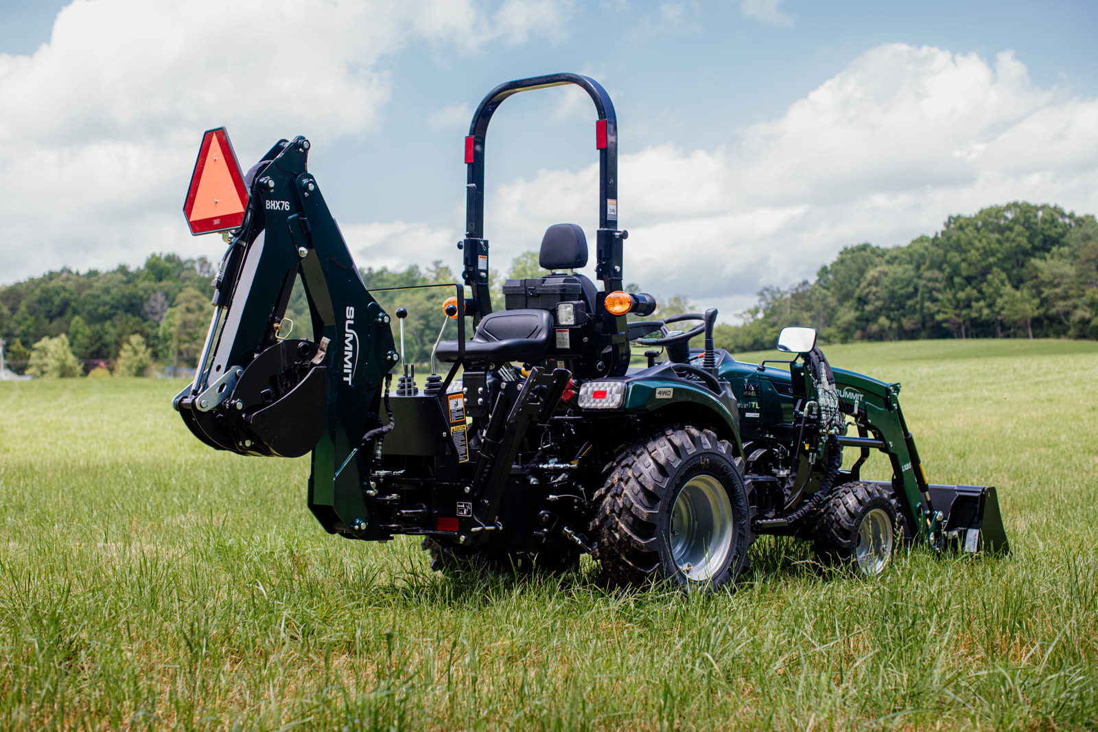 Summit TX25H compact tractor with LX85 loader and BHX76 backhoe